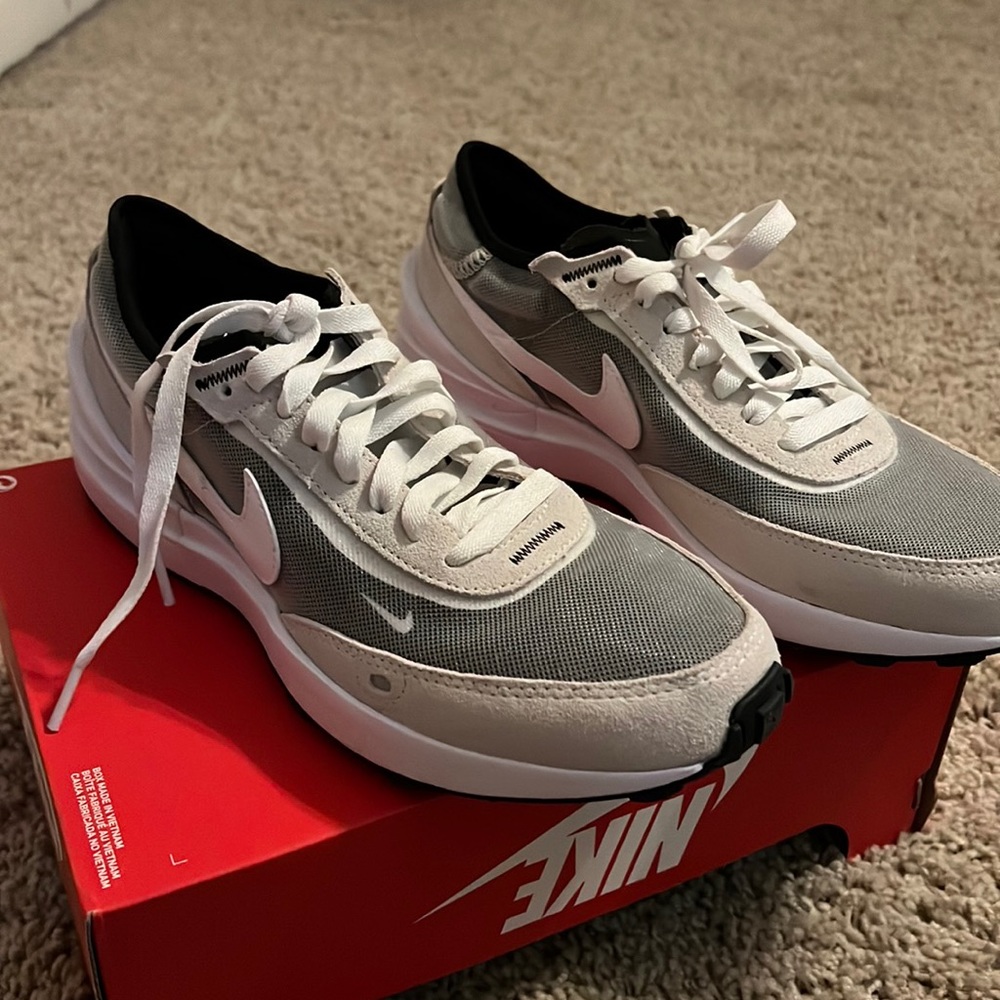 Nike waffle one (GS) shoes. Never worn bran new just too big for me.